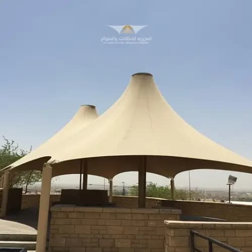 مظلات الشد الإنشائي بشبك (HDPE) عالي الكثافة